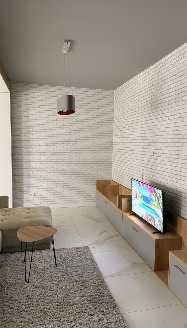 Zona de TV, aceeași poză după corecția de lumină, claritate și culoare